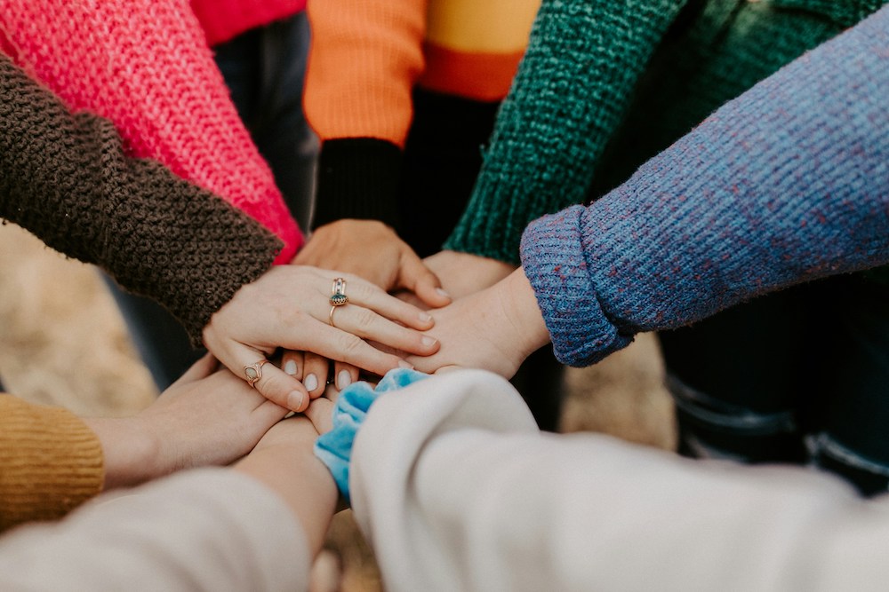 Nonprofit organization gathering hands